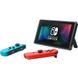 Портативная игровая приставка - Nintendo Switch with Neon Blue and Neon Red Joy-Con